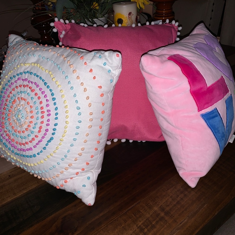 Pink and pastel colored pillows